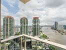 View from balcony overlooking the river and city skyline