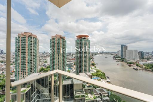 View from balcony overlooking the river and city skyline