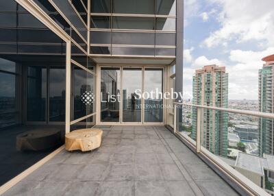 High-rise apartment balcony with city view