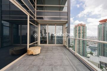 High-rise apartment balcony with city view