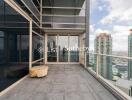 High-rise apartment balcony with city view