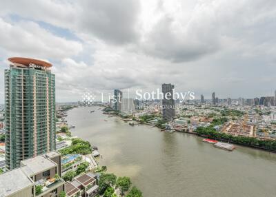 Panoramic view of a city with river and high-rise buildings