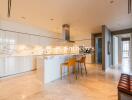 Modern kitchen with island and bar stools