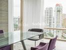 Modern dining area with glass table and city view