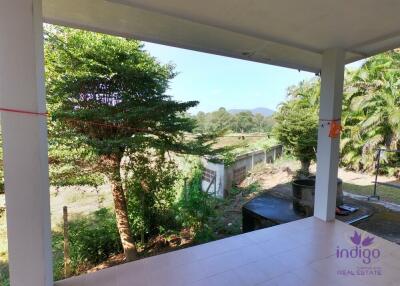 Lovely 2 bedroom bungalow with a large garden for sale in Luang Nuea, Doi Saket, Chiang Mai. Near Tao Garden.