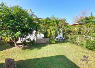 Lovely 2 bedroom bungalow with a large garden for sale in Luang Nuea, Doi Saket, Chiang Mai. Near Tao Garden.