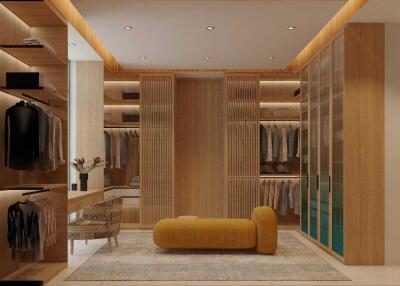 Spacious walk-in closet with seating area and ample storage