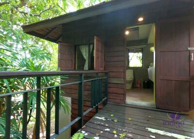 Charming countryside retreat with lots of  mature trees and traditional Thai rice barns at Sanpatong Chiang Mai