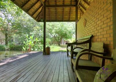 Charming countryside retreat with lots of  mature trees and traditional Thai rice barns at Sanpatong Chiang Mai