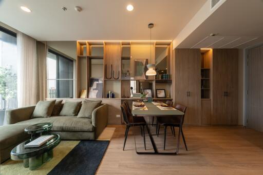 Modern living room with dining area and built-in storage