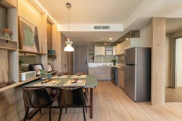 Modern kitchen and dining area with wooden finishes