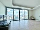 Spacious living room with a large window view