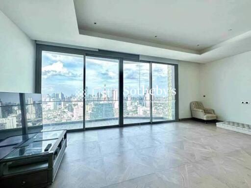 Spacious living room with a large window view