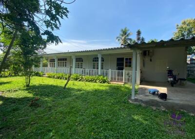 Land with 2 houses Lovely property in Mae Rim countryside ideal as a holiday home or a hobby farm.