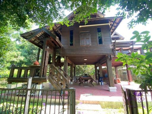 Land with 2 houses Lovely property in Mae Rim countryside ideal as a holiday home or a hobby farm.