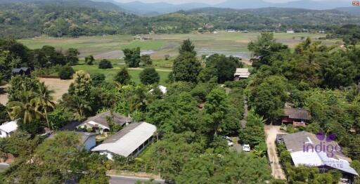 Land with 2 houses Lovely property in Mae Rim countryside ideal as a holiday home or a hobby farm.