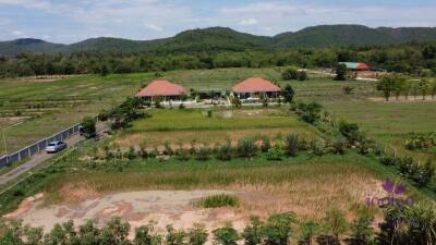 Wonderful established self-sufficient farm for sale with 2 well-built houses in the countryside in Lamphun