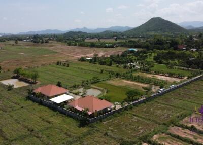 Wonderful established self-sufficient farm for sale with 2 well-built houses in the countryside in Lamphun