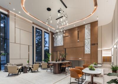 Main living area with modern decor and high ceilings