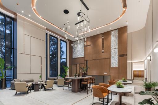 Main living area with modern decor and high ceilings