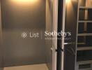 Spacious walk-in closet with ample storage and lighting