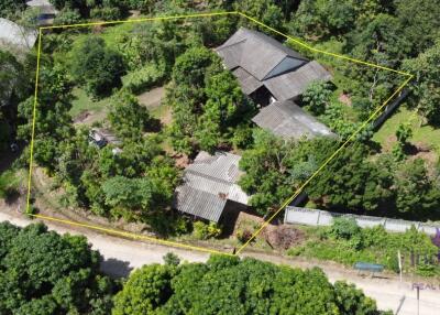 Lovely sloping plot on the side of a hill overlooking rice fields. Saluang, Mae Rim.