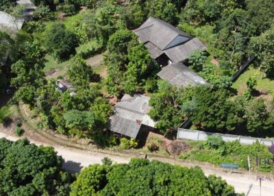 Lovely sloping plot on the side of a hill overlooking rice fields. Saluang, Mae Rim.