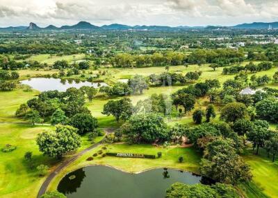 Aerial view of a lush landscape with lakes and greenery