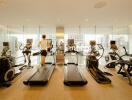 Modern fitness room with various exercise equipment