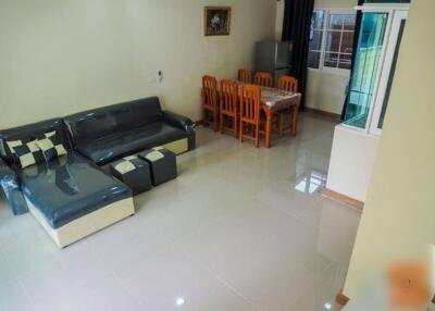 Spacious modern living room with dining area