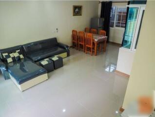 Spacious modern living room with dining area