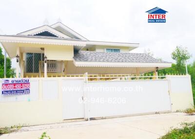 Front view of a house with gated entrance