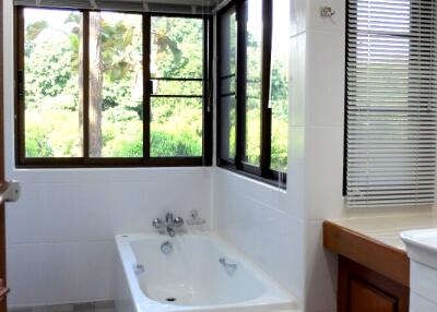 Two bedroom fully furnished house for rent in Mae Rim.  Overlooks the mountains and surrounded by mature trees