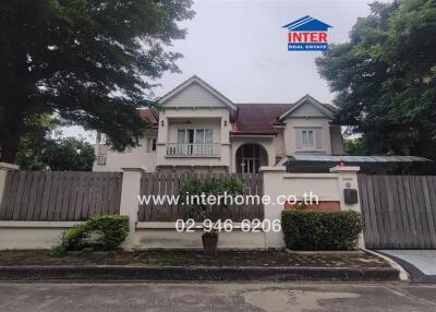 Exterior view of a house with a front yard