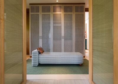 Stylish bedroom with a patterned wardrobe and a daybed