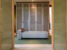 Stylish bedroom with a patterned wardrobe and a daybed