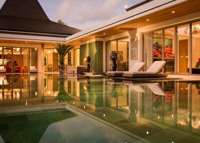 Modern luxury villa with pool at twilight