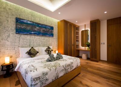 Modern bedroom with wooden furniture and decorative elements