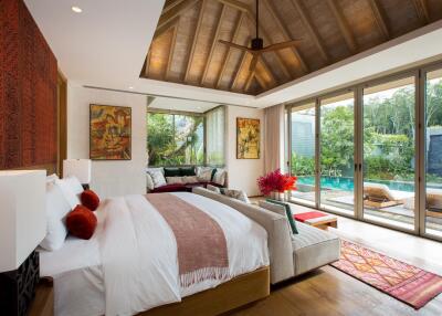 Luxurious bedroom with pool view and elegant decor