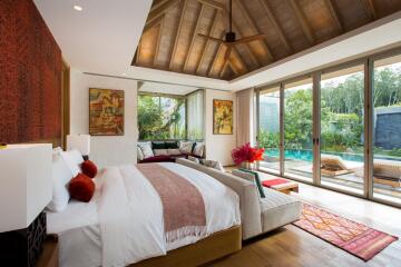 Luxurious bedroom with pool view and elegant decor