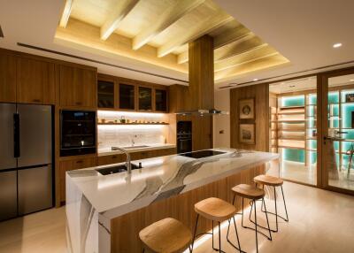 Modern kitchen with island and bar stools