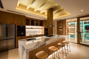 Modern kitchen with island and bar stools