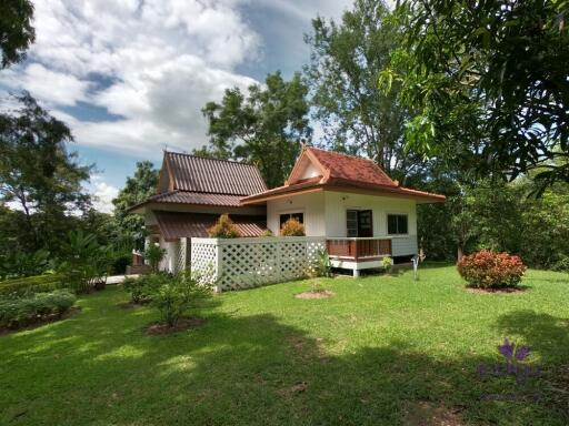 Lovely 1-2 bedrooms split level home amongst trees. The house is on a large property in Mae Rim with a few other houses. Mae Rim Chiang Mai