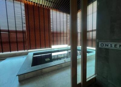 Indoor spa area with sunken pool