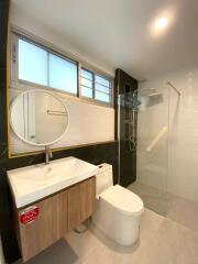 Modern bathroom with shower and vanity