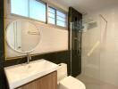 Modern bathroom with shower and vanity