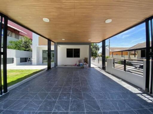 Covered outdoor area with tiled flooring