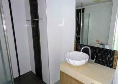 Modern bathroom with shower and vanity