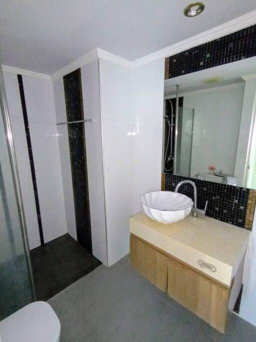 Modern bathroom with shower and vanity