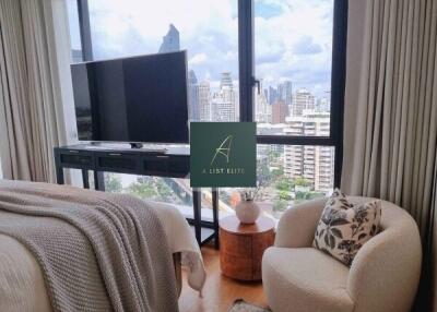 Bedroom with city view and modern furnishings